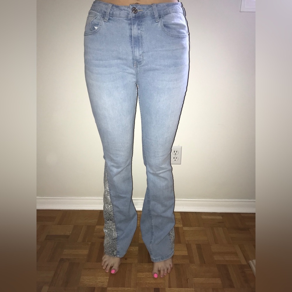 Forever 21 light wash flare jeans with detailing on leg
